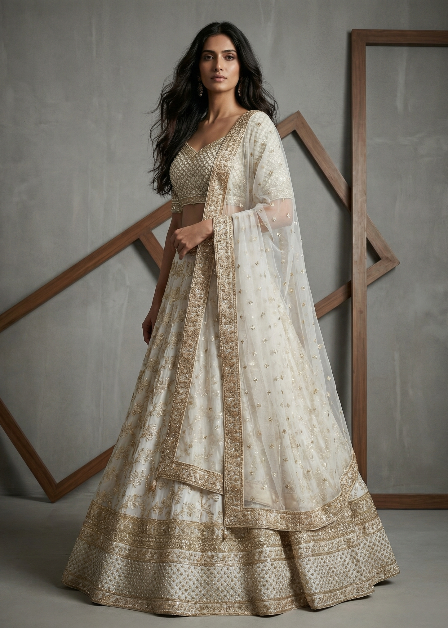 Woman wearing a traditional outfit with intricate patterns against a neutral background