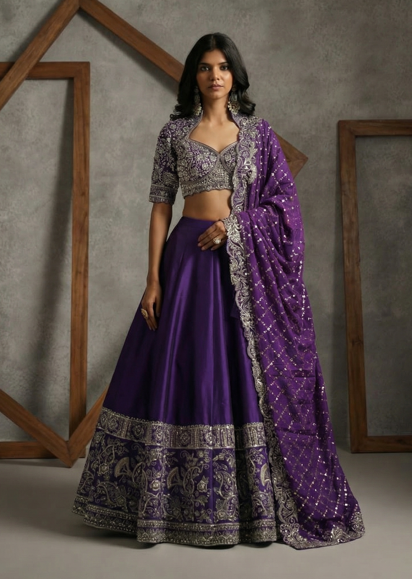 Woman wearing a purple traditional outfit with a gray background
